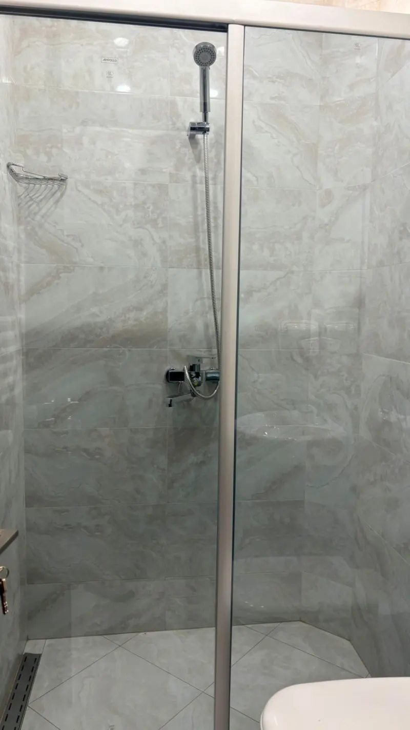 Glass shower enclosure detail